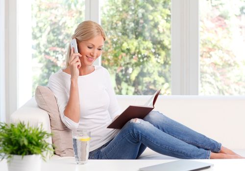 Woman calling to make an appointment with our Washington PA dentist